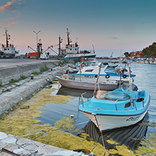 Sunset seascape with boats on the port of Sozopol, Burgas Region, Bulgaria