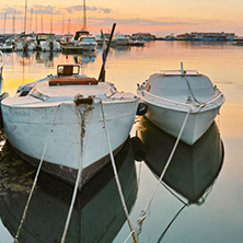 Sunset seascape with small boats at the port of Sozopol, Burgas Region, Bulgaria