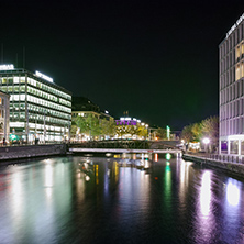 Amazing night photo of City of Geneva and Reflection in Rhone River, Switzerland