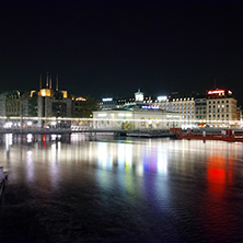 Night lights of city of Geneva and Reflectionin the lake, Switzerland