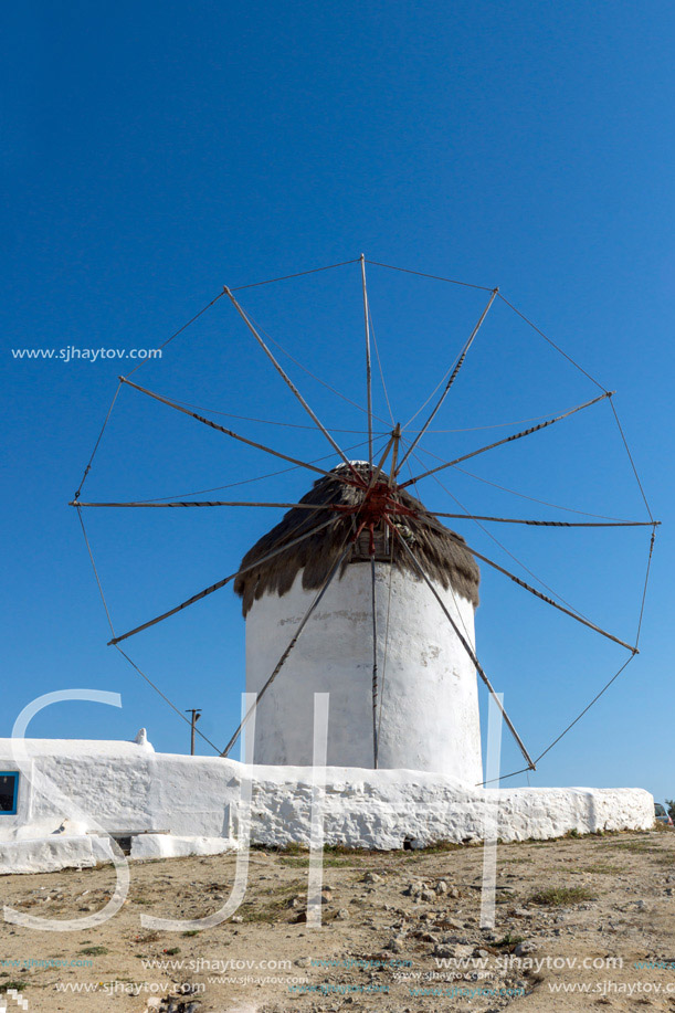 White windmill and blue sky on the island of Mykonos, Cyclades, Greece