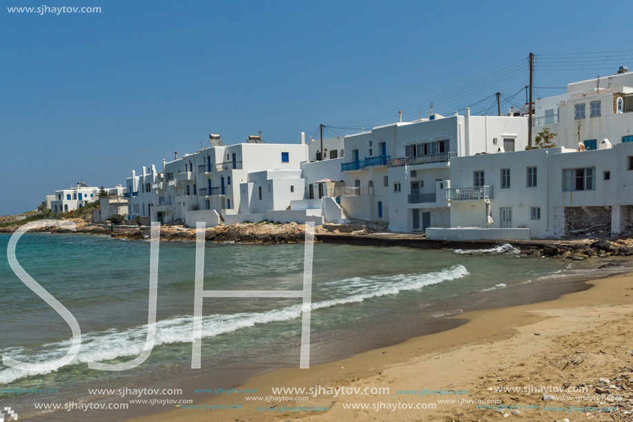 Small beach and white houses in town of Naoussa, Paros island, Cyclades, Greece