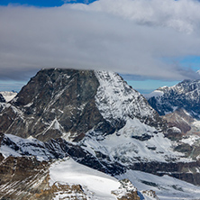 clouds covering Swiss Alps near Mount Matterhorn, Canton of Valais, Switzerland