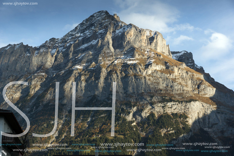 Village of Grindelwald and mount Wetterhornin Alps near town of Interlaken, Switzerland