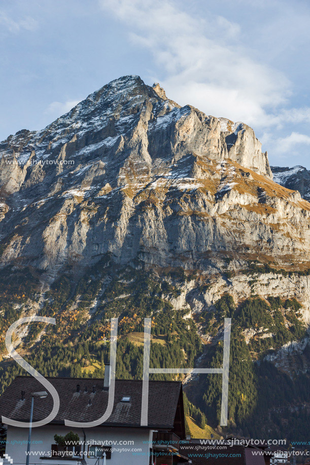 Village of Grindelwald and mount Wetterhornin Alps near town of Interlaken, Switzerland