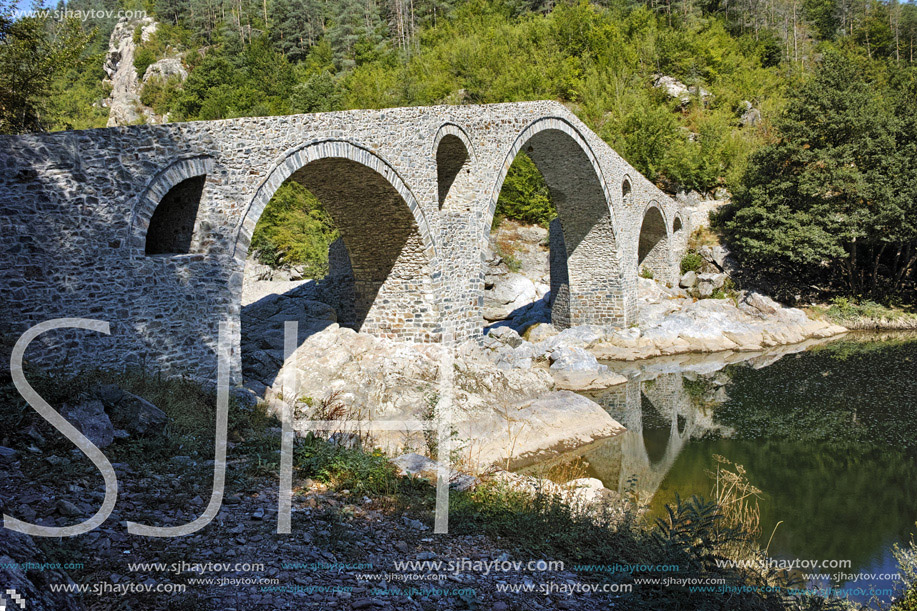 Amazing Reflection of The Devil"s Bridge in Arda river and Rhodopes mountain, Kardzhali Region, Bulgaria