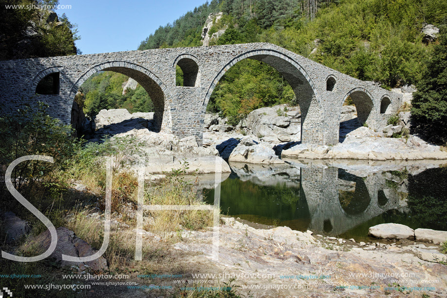 Amazing Reflection of The Devil"s Bridge in Arda river and Rhodopes mountain, Kardzhali Region, Bulgaria