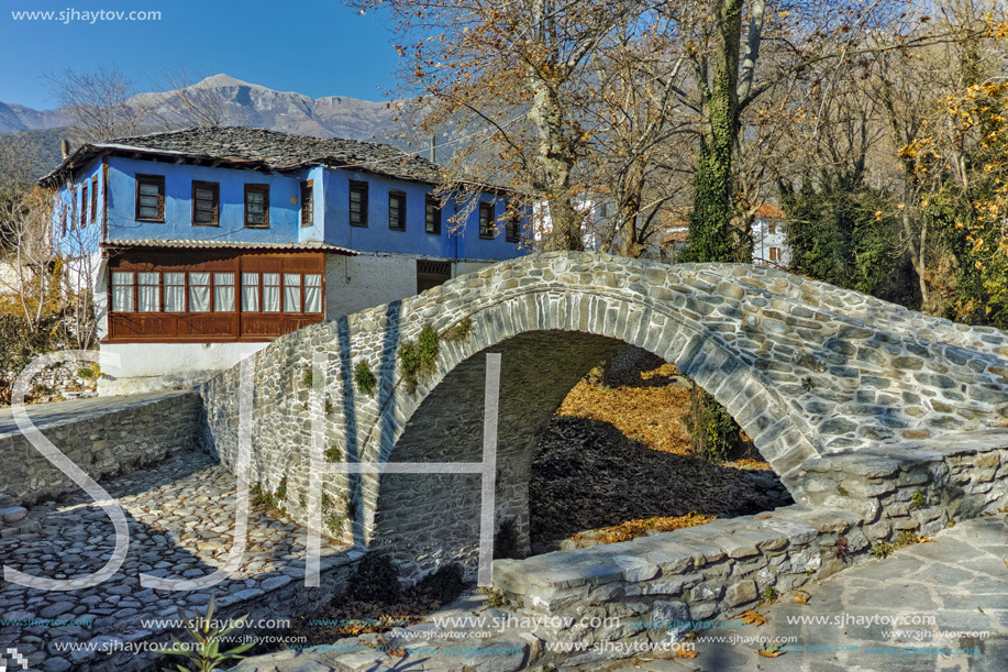 Old house and ancient bridge in village of Moushteni near Kavala, East Macedonia and Thrace, Greece