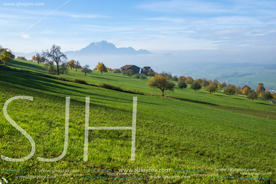 Mount Pilatus and Lake Lucerne covered with frog, Alps, Switzerland