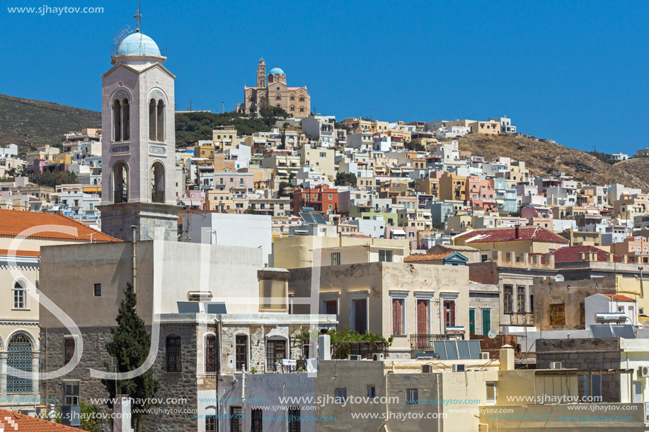 Panoramic view with belfry of Churches in town of Ermopoli, Syros, Cyclades Islands, Greece