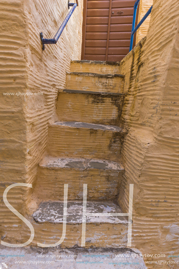 Yellow staircase in old town of Ermopoli, Syros, Cyclades Islands, Greece