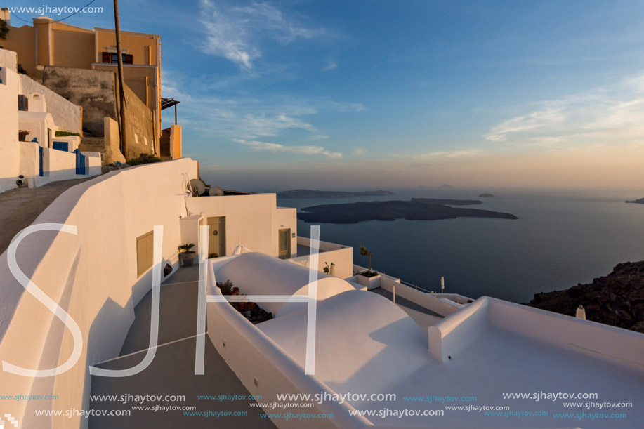 Panoramic view of Santorini island and Sunset over town of Imerovigli, Thira, Cyclades, Greece