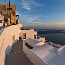 Panoramic view of Santorini island and Sunset over town of Imerovigli, Thira, Cyclades, Greece