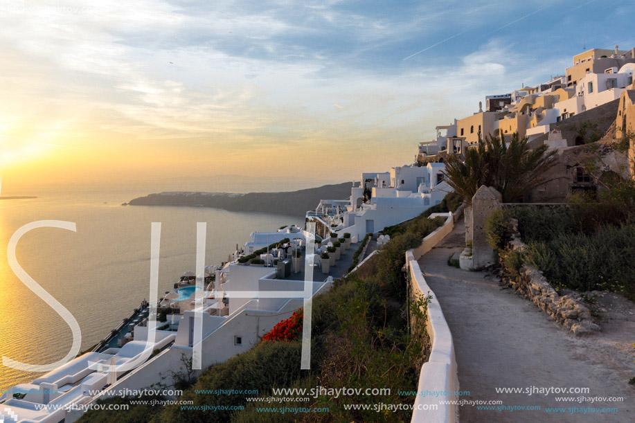 Panoramic sunset view of town of Imerovigli, Santorini island, Thira, Cyclades, Greece