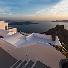 Amazing sunset in town of Imerovigli, Santorini island, Thira, Cyclades, Greece