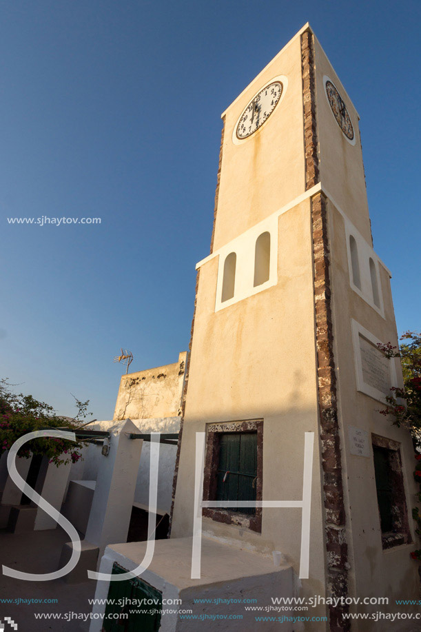 Old Clock tower in town of Oia, Santorini island, Thira, Cyclades, Greece