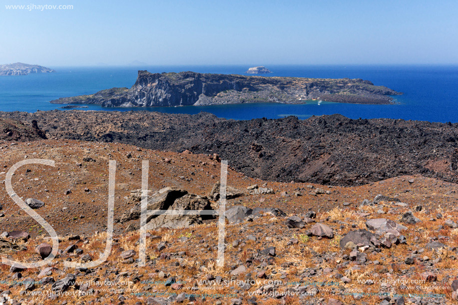 View of Palea Kameni island from volcano in Nea Kameni near Santorini, Cyclades, Greece