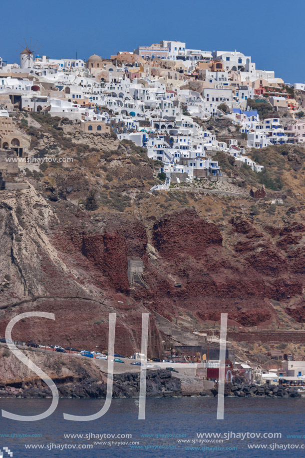 Oia town over rock in  Santorini island, Cyclades, Greece