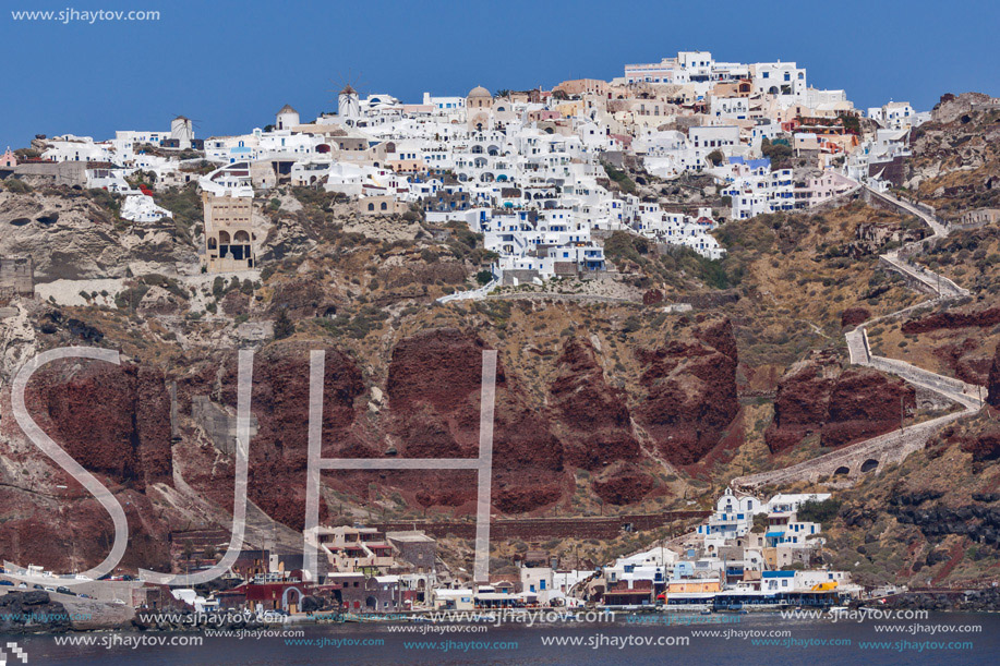 Amazing view of port of Oia town, Santorini island, Cyclades, Greece
