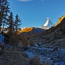 First Rays of Sun over Matterhorn peak, view from Zermatt, Canton of Valais, Switzerland