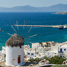 Panoramic view of white windmill and island of Mykonos, Cyclades, Greece