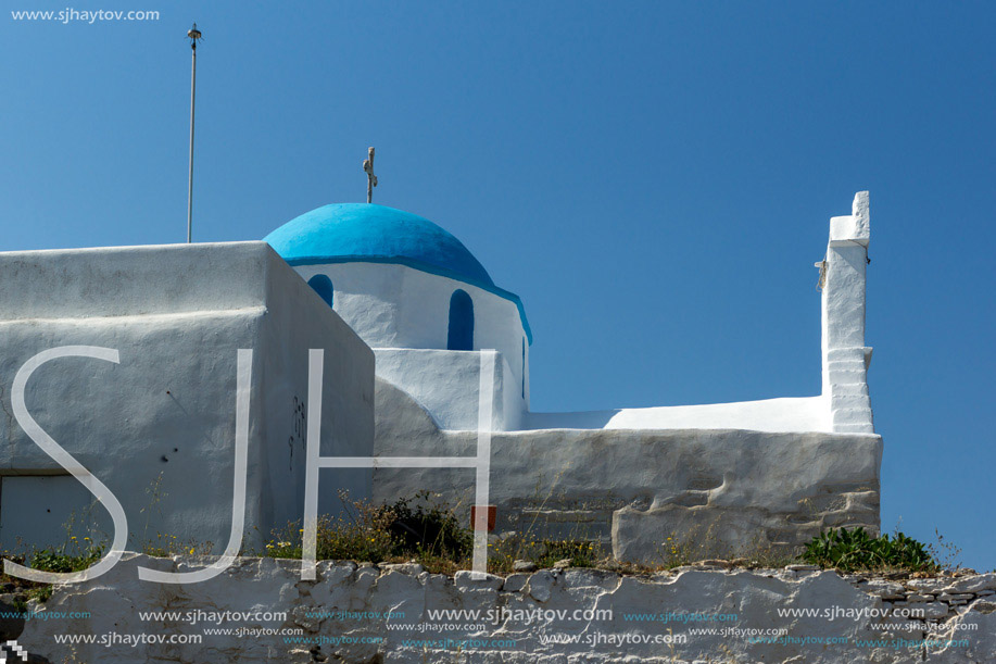 White chuch with blue roof in town of Parakia, Paros island, Cyclades, Greece