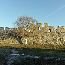 Last rays of sun over Wall of fortress of Kavala, East Macedonia and Thrace, Greece