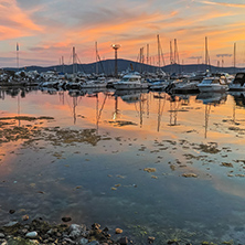 Sunset seascape with small boats at the port of Sozopol, Burgas Region, Bulgaria