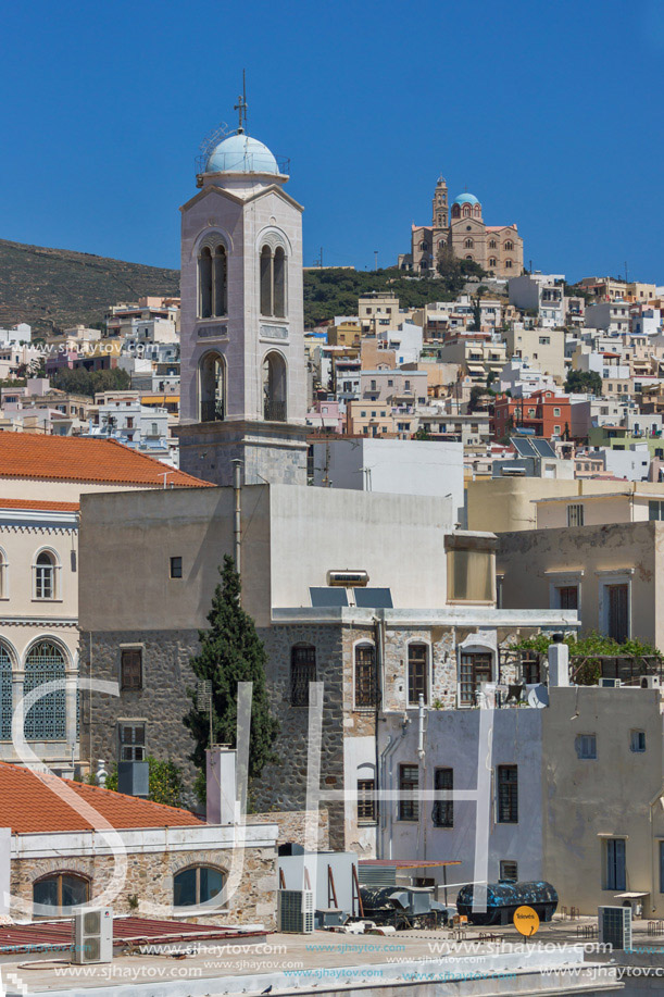 Panoramic view with belfry of Churches in town of Ermopoli, Syros, Cyclades Islands, Greece