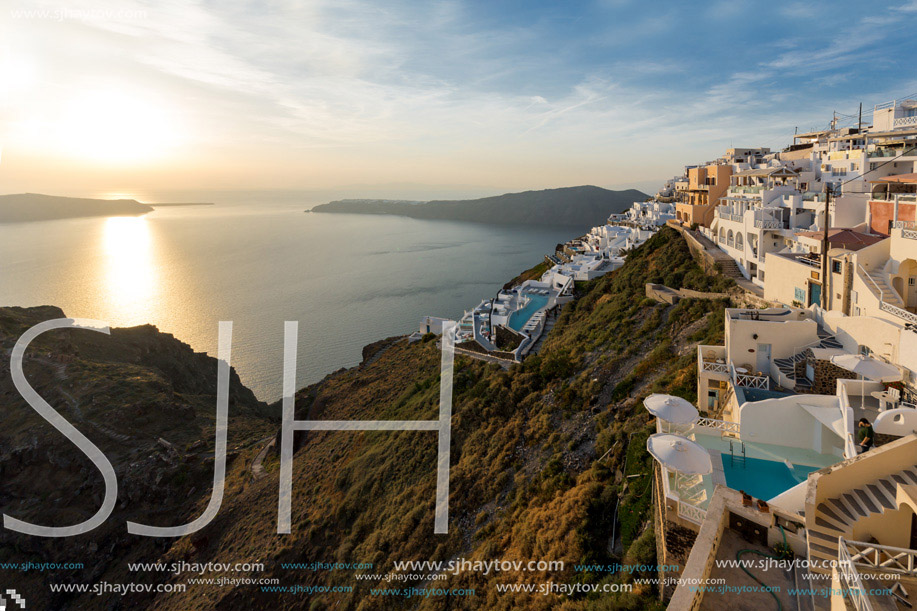 Panoramic sunset view of town of Imerovigli, Santorini island, Thira, Cyclades, Greece