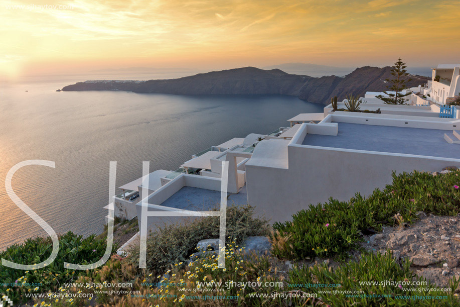 Amazing sunset view from town of Imerovigli to yown of Oia, Santorini island, Thira, Cyclades, Greece