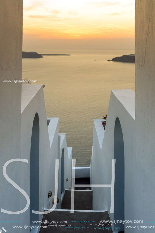 White houses and Sunset landscape in town of imerovigli, Santorini island, Thira, Cyclades, Greece