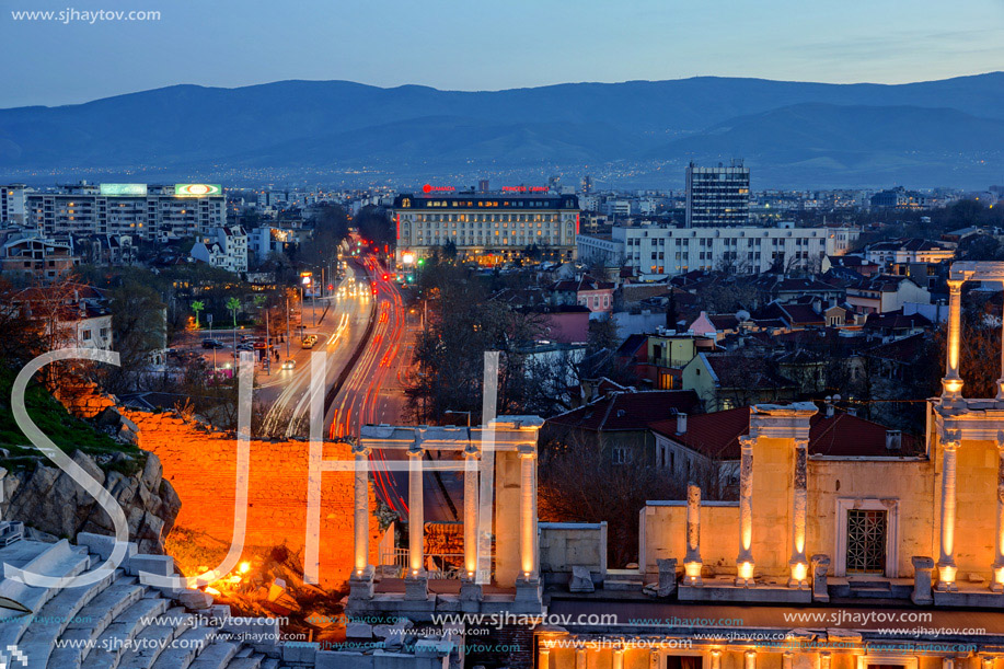 Amazing night landscape of Ancient Roman theatre and city of Plovdiv, Bulgaria