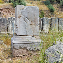Ancient column in Ancient Greek archaeological site of Delphi, Central Greece