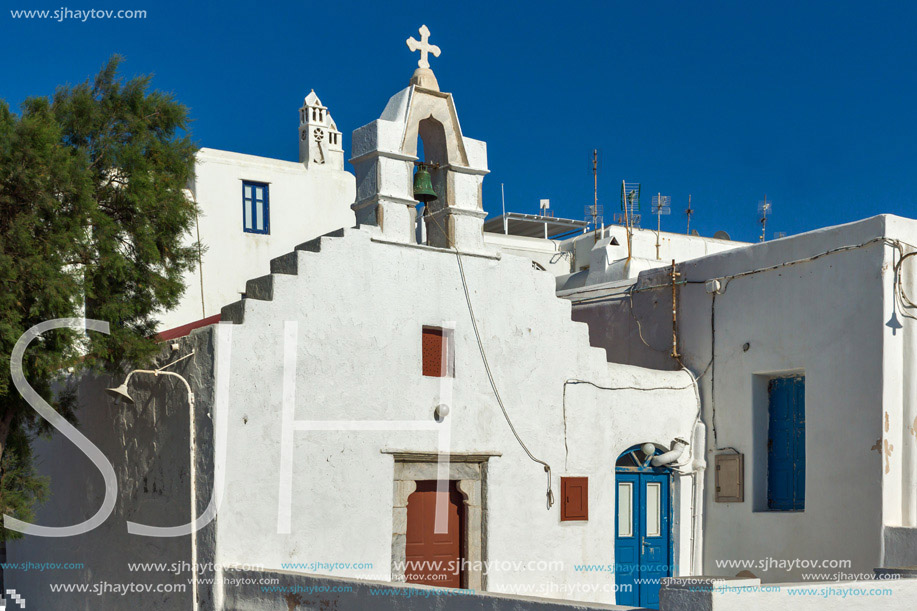 White orthodox church and belfry in Mykonos, Cyclades Islands, Greece