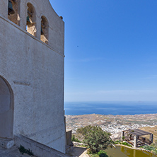 Entrance of Monastery Prophet Elias and panorama to Santorini island, Thira, Cyclades, Greece