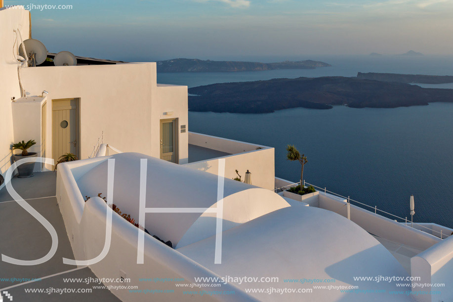 Amazing sunset view from town of Imerovigli to volcano, Santorini island, Thira, Cyclades, Greece