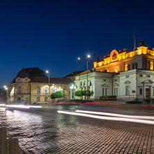 The lights of cars passing in front  of National Assembly in city of Sofia, Bulgaria