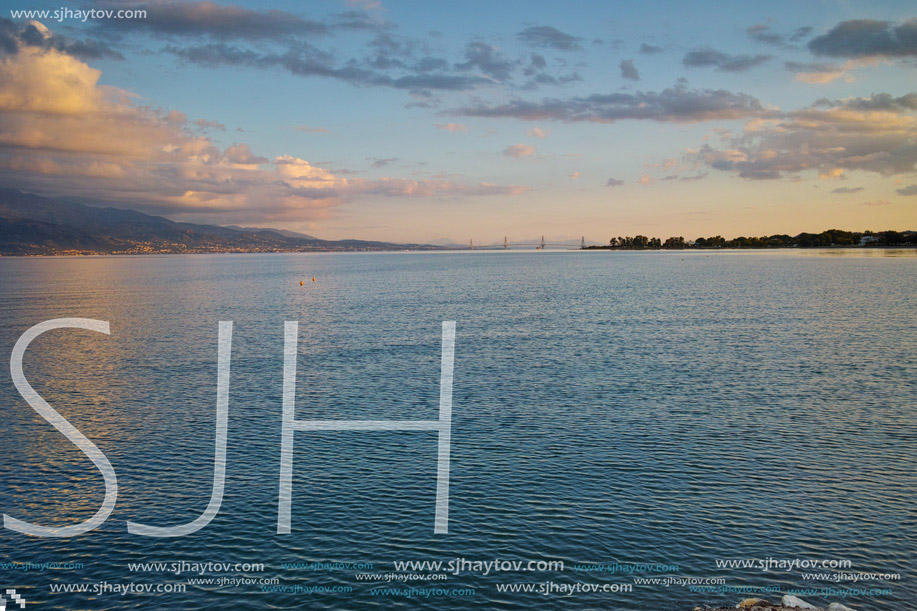 Sunset over The cable bridge between Rio and Antirrio view from Nafpaktos, Patra, Western Greece