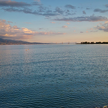 Sunset over The cable bridge between Rio and Antirrio view from Nafpaktos, Patra, Western Greece