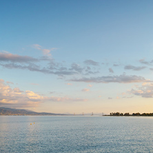Sunset over The cable bridge between Rio and Antirrio view from Nafpaktos, Patra, Western Greece