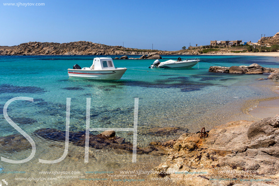 Small boat in Paranga Beach on the island of Mykonos, Cyclades, Greece