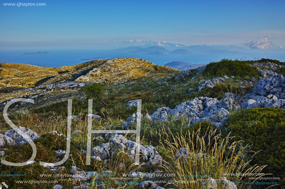 Rural landscape of mountain of Lefkada with meadow with poppies,  Ionian Islands, Greece