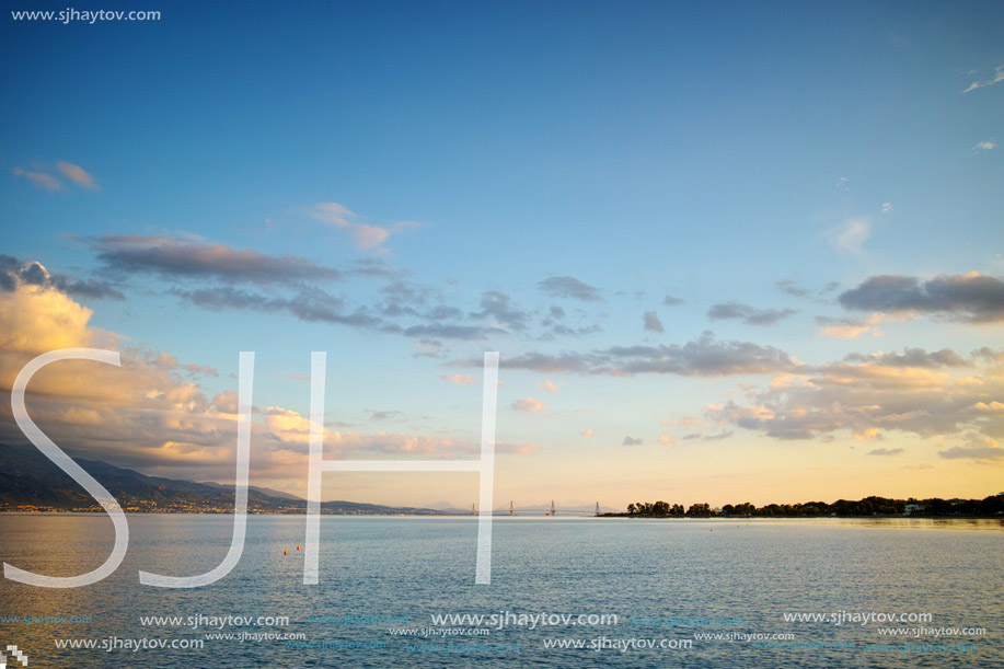 Sunset over The cable bridge between Rio and Antirrio view from Nafpaktos, Patra, Western Greece