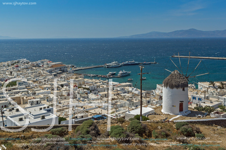 Panorama with white windmill and island of Mykonos, Cyclades, Greece