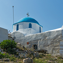 White chuch with blue roof in town of Parakia, Paros island, Cyclades, Greece