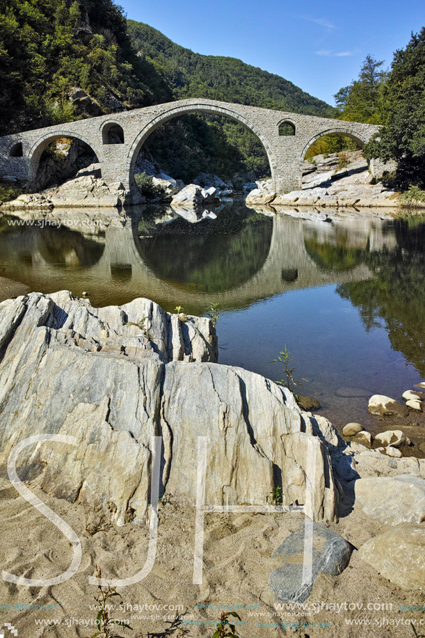 Amazing Reflection of The Devil"s Bridge in Arda river and Rhodopes mountain, Kardzhali Region, Bulgaria