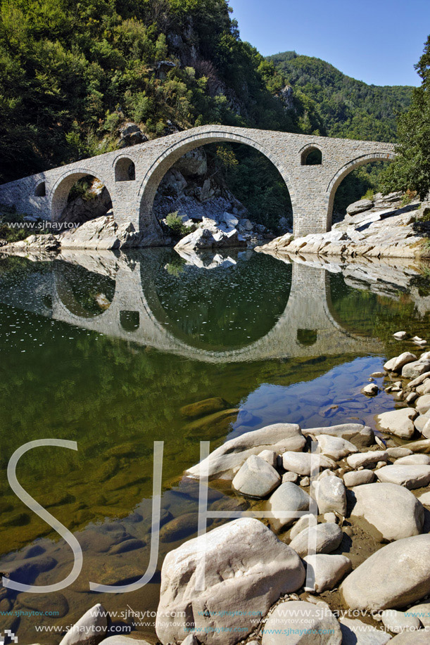 Amazing Reflection of The Devil"s Bridge in Arda river and Rhodopes mountain, Kardzhali Region, Bulgaria