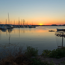 Sunset seascape with boats on the port of Sozopol, Burgas Region, Bulgaria
