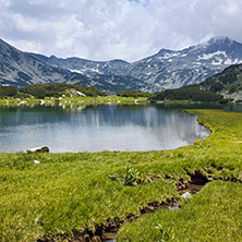 Dark Clouds over Banderishki chukar peak and mountain river, Pirin Mountain, Bulgaria